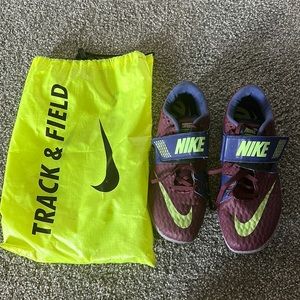 slightly worn high jump shoes with spikes. one spike is missing. used for javlin